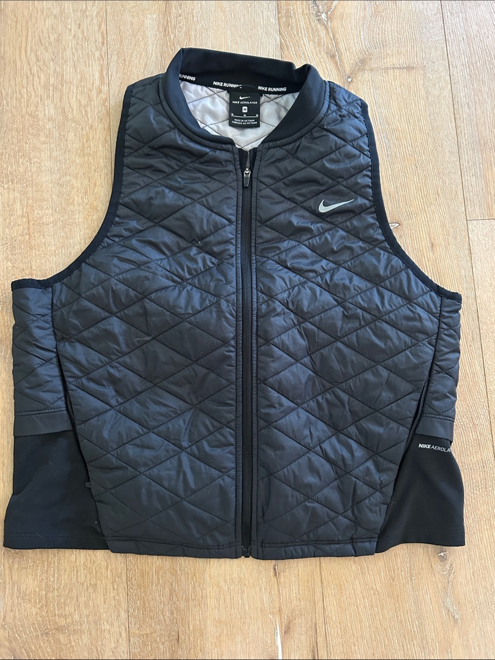 Nike Black Quilted Nike Running Vest with Silver Swoosh